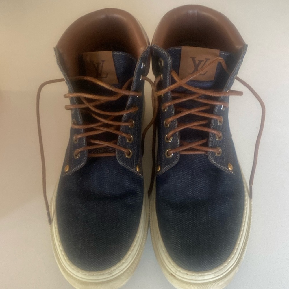 Louis Vuitton high tops.  Perfect as new